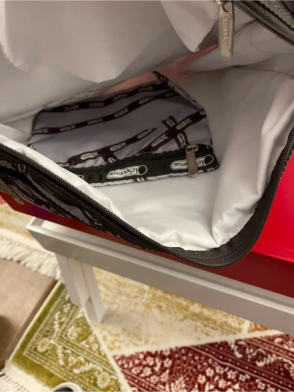 Lesportsac White and Brown Patterned Messenger Bag